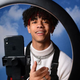 A TikToker making a video